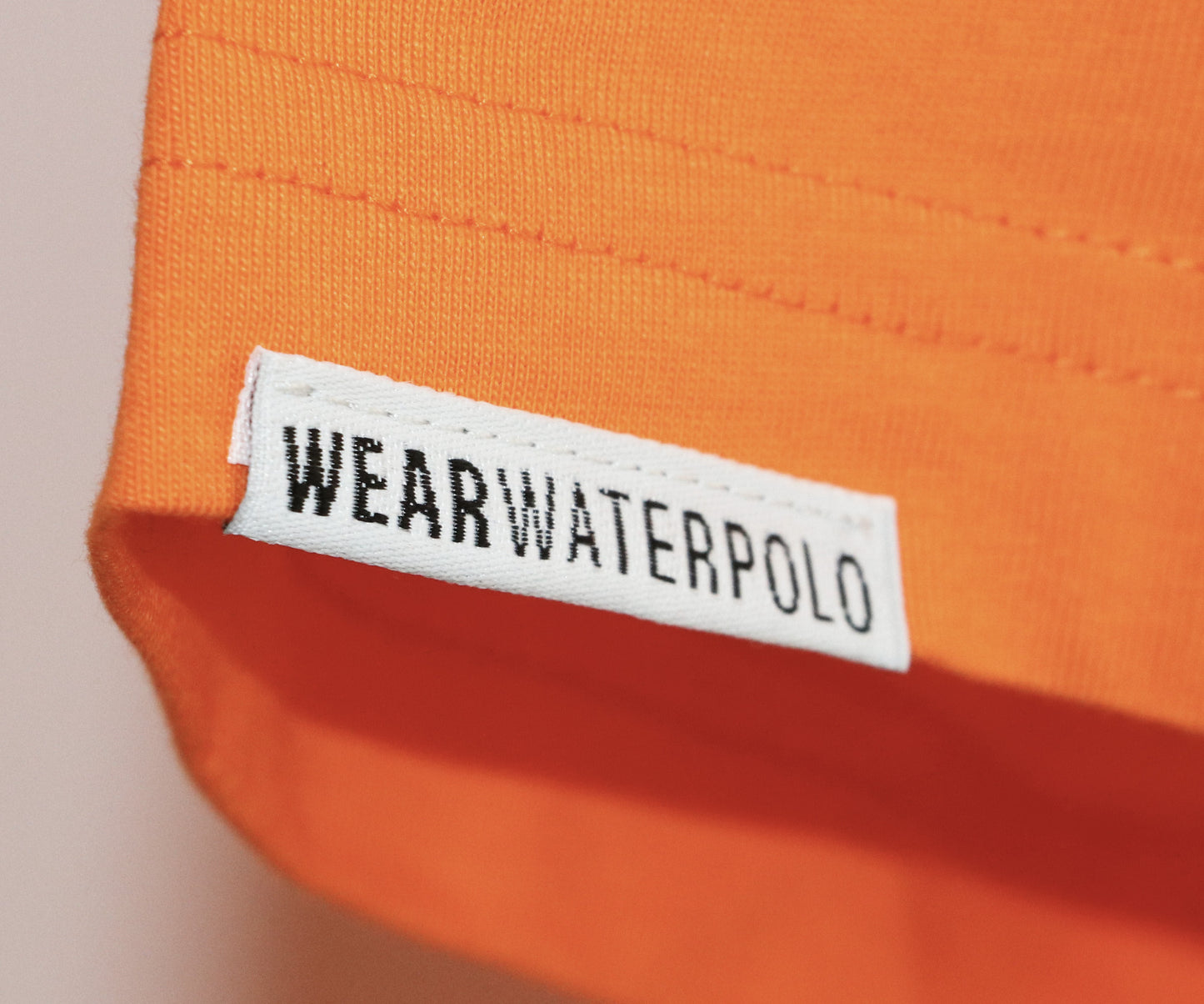TW Wordmark Orange | T-Shirt